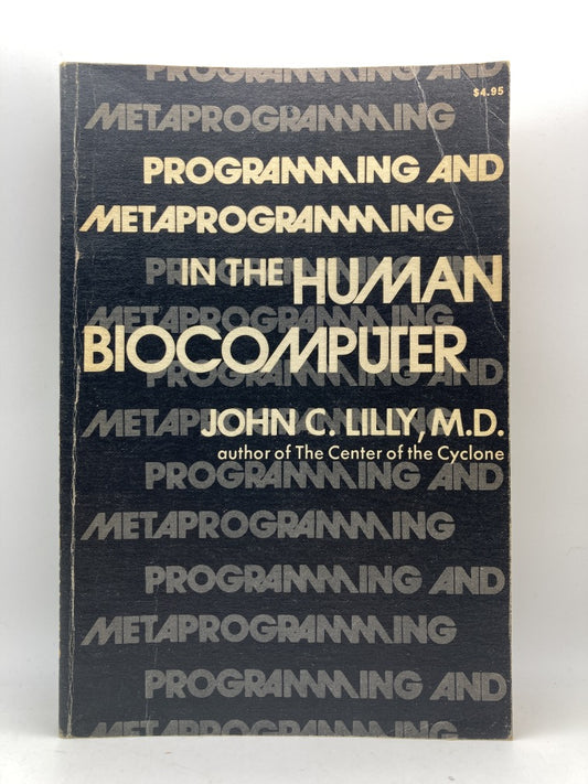 Programming and Metaprogramming in the Human Biocomputer