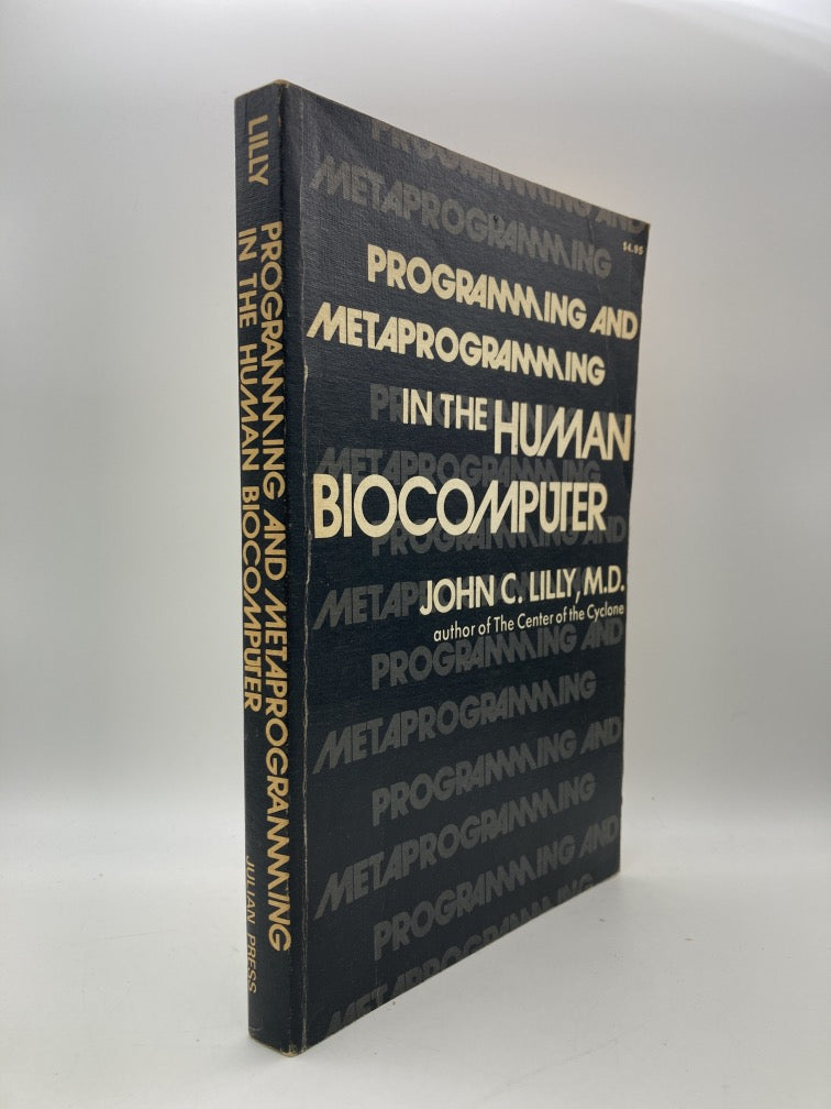 Programming and Metaprogramming in the Human Biocomputer